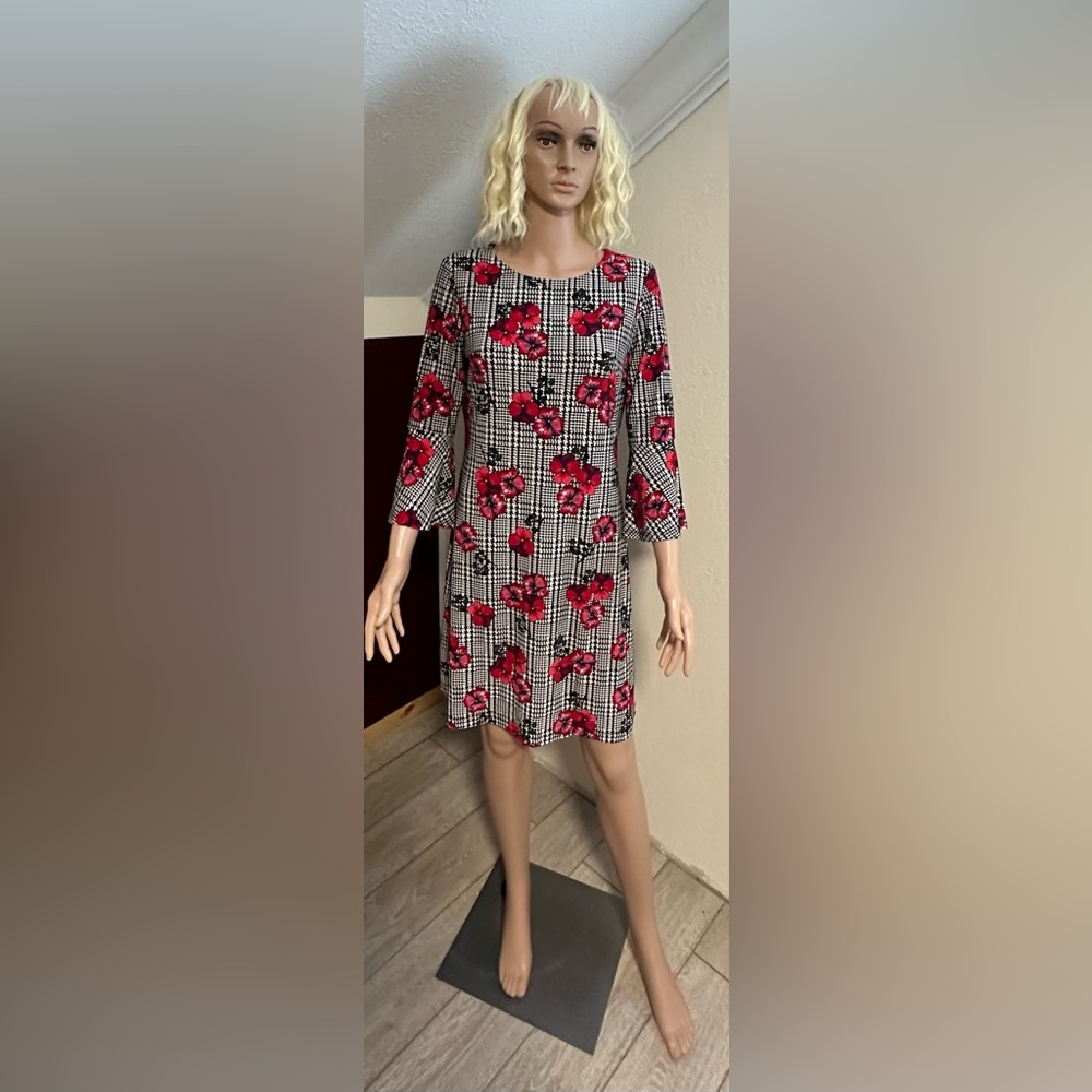 Black and white dress with red flowers